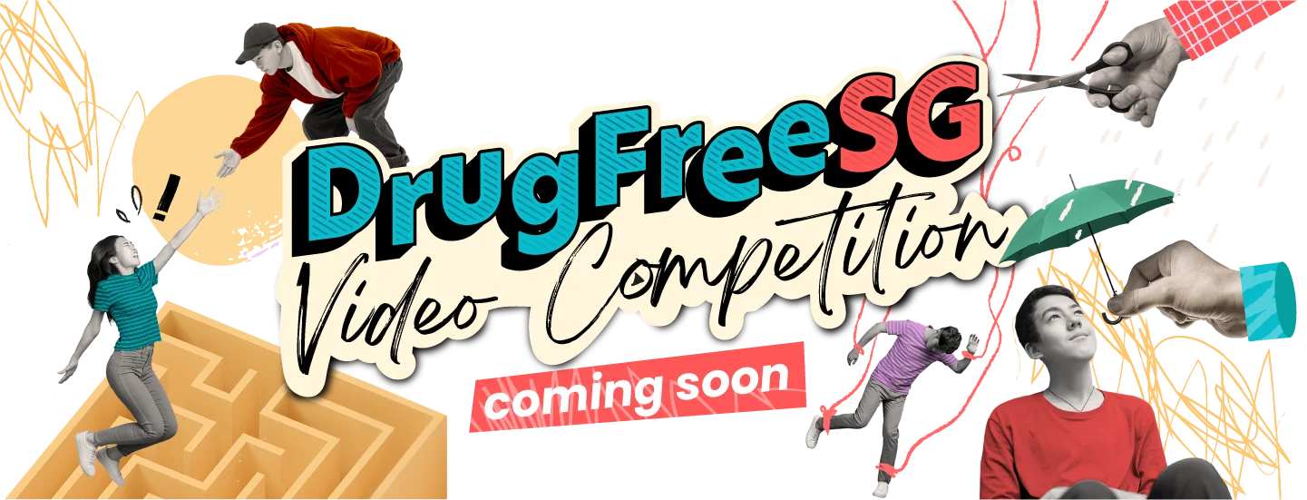 Banner for DrugFreeSG Video Competition showing people, a maze, scissors, and an umbrella.